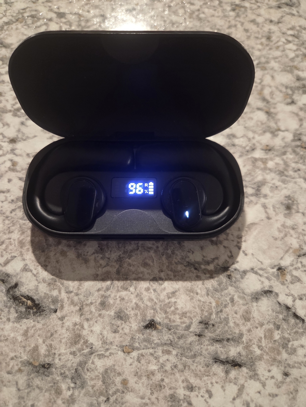 New black true wireless, open-ear earbuds with a digital charging display